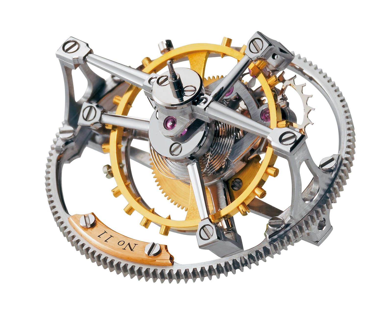 Freigestellte Aufnahme des Tourbillon-Mechanismus mit goldfarbenem Rad, silbernen Käfigarmen und einem grossen gezahnten äusseren Ring