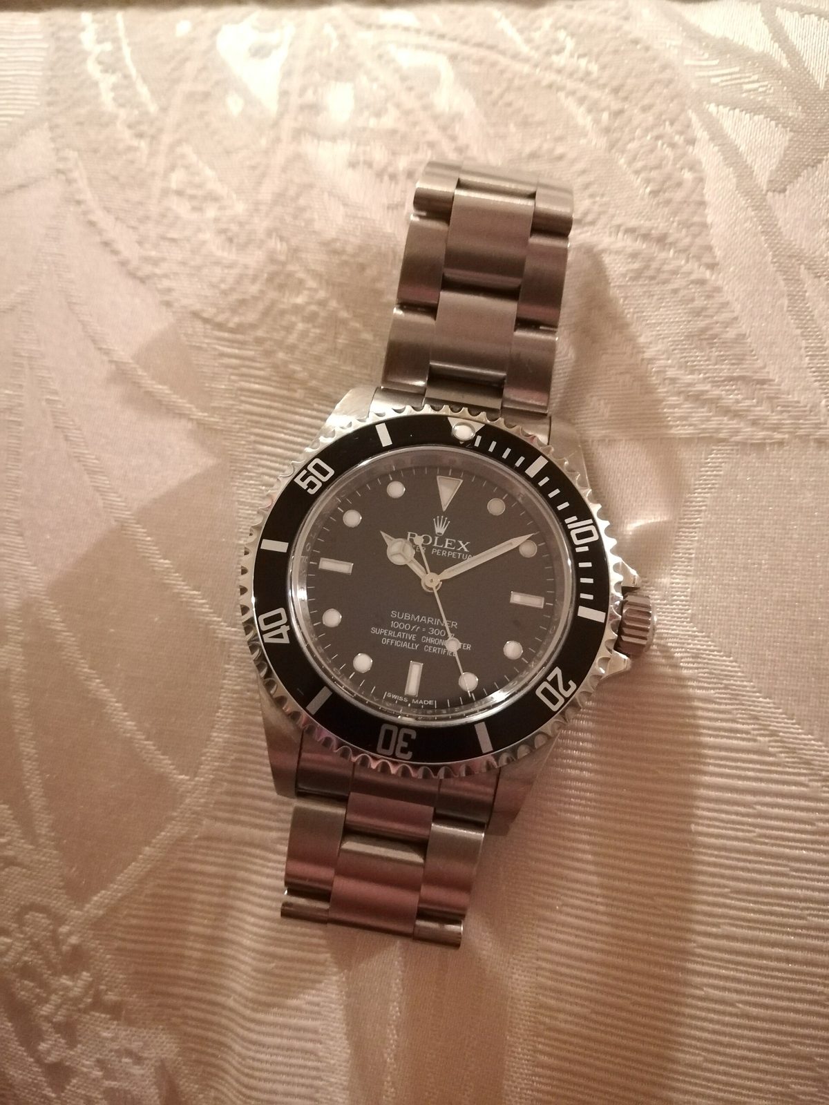 Rolex Submariner aus Stahl mit schwarzer Drehlünette und Gliederband